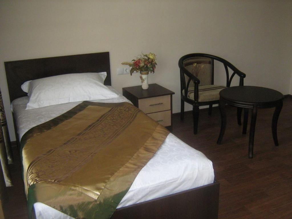 Kausar Hotel Almaty Quarto foto