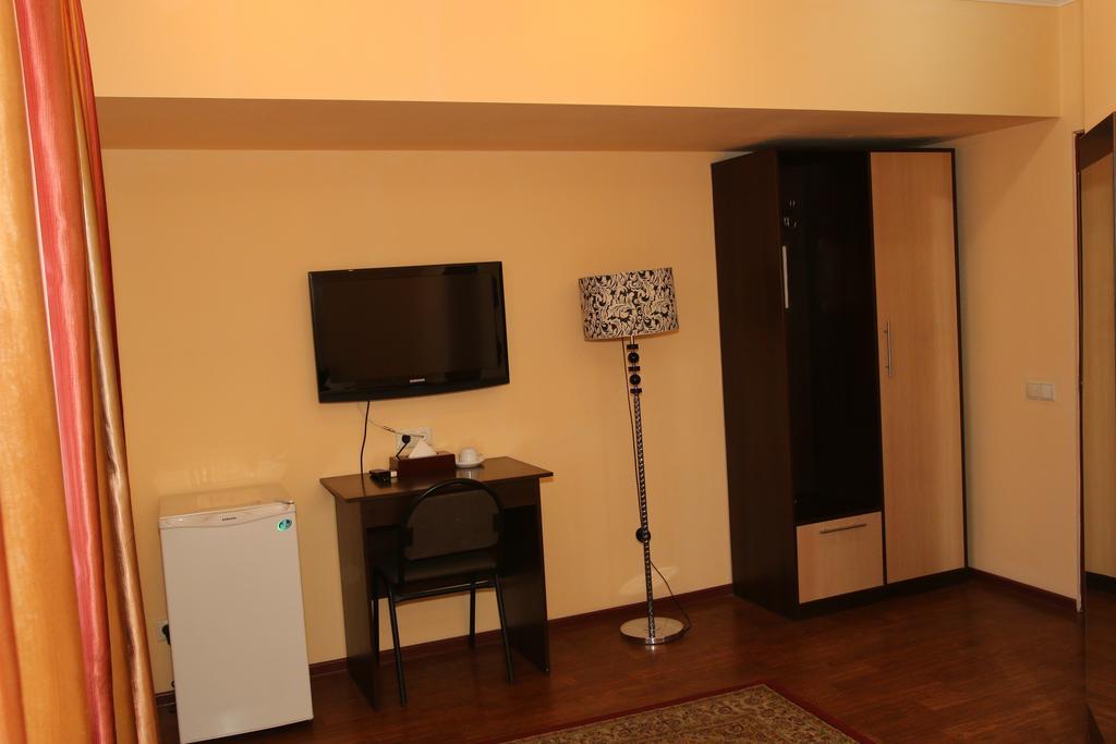 Kausar Hotel Almaty Quarto foto